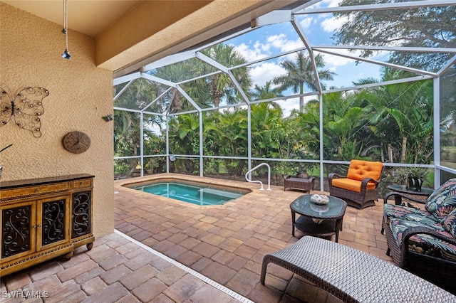 14194 Fall Creek Ct, Naples, FL 34114 - view of patio / terrace with a hot tub, glass enclosure, and an outdoor living space