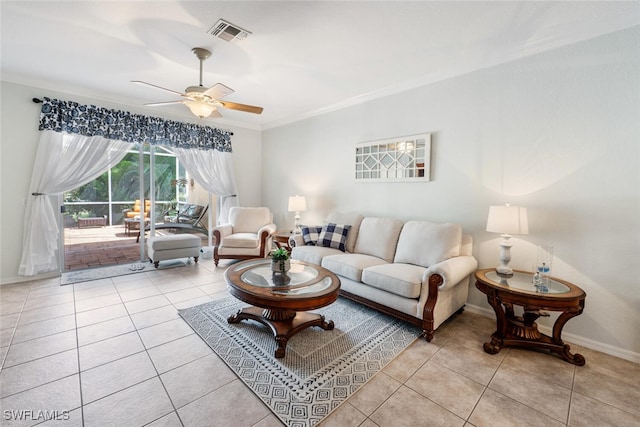 14194 Fall Creek Ct, Naples, FL 34114 - living area featuring a ceiling fan, crown molding, light tile patterned flooring, and baseboards