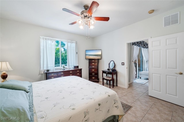 14194 Fall Creek Ct, Naples, FL 34114 - bedroom featuring light tile patterned floors, ceiling fan, and baseboards