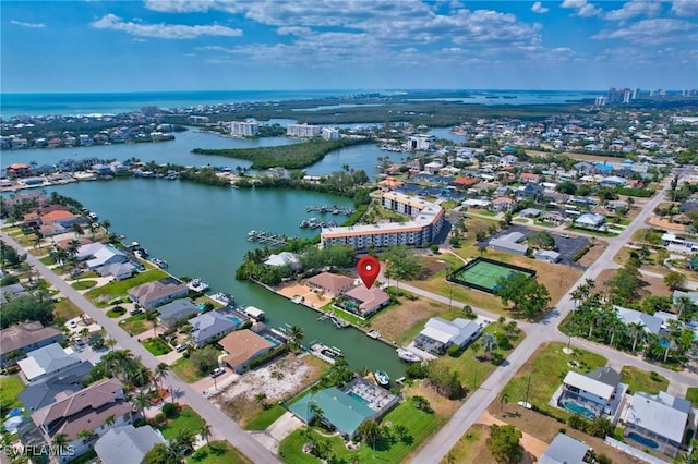 aerial view with a residential view and a water view