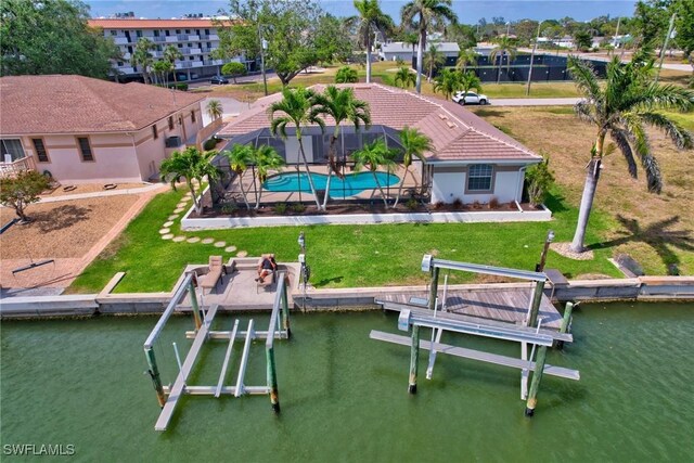 dock area featuring a water view and boat lift