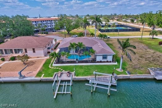 bird's eye view with a water view