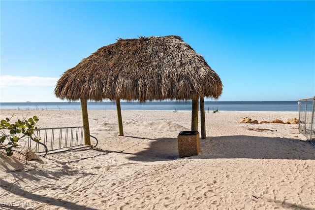 view of water feature with a gazebo and a view of the beach