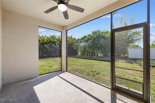 1322 SW 22nd Ave, Cape Coral, FL 33991 - unfurnished sunroom with plenty of natural light and a ceiling fan