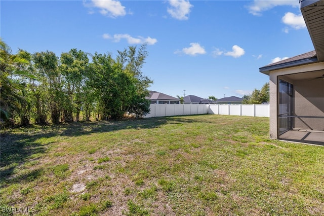 1322 SW 22nd Ave, Cape Coral, FL 33991 - view of yard featuring fence and a sunroom