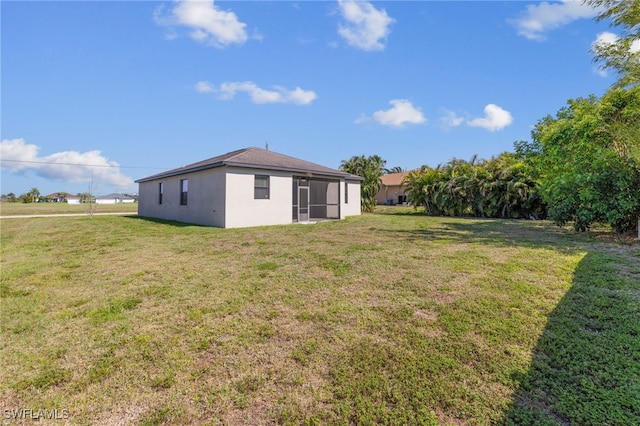 1322 SW 22nd Ave, Cape Coral, FL 33991 - view of yard featuring a sunroom