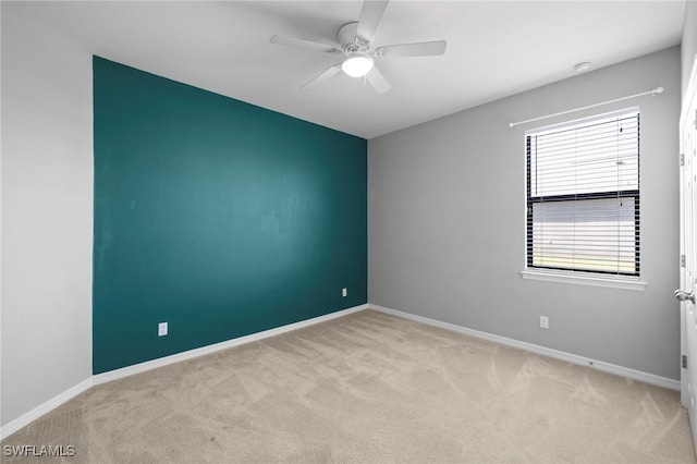 1322 SW 22nd Ave, Cape Coral, FL 33991 - spare room featuring ceiling fan, baseboards, and carpet