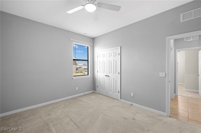 1322 SW 22nd Ave, Cape Coral, FL 33991 - unfurnished bedroom featuring baseboards, visible vents, carpet floors, and a closet