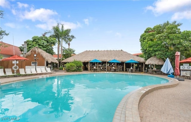 pool with a patio