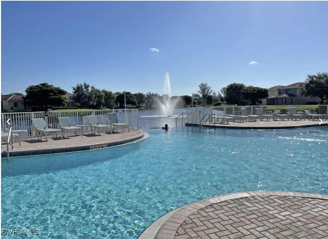 8799 Spring Mountain Way, Fort Myers, FL 33908 - pool featuring a patio area and fence