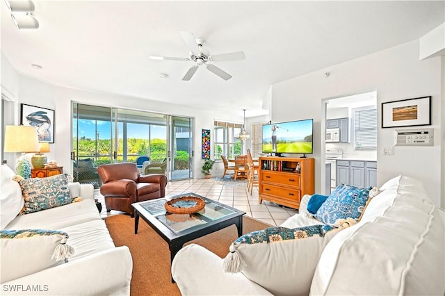 27071 Lake Harbor Ct Unit 103, Bonita Springs, FL 34134 - living area with ceiling fan and light tile patterned floors