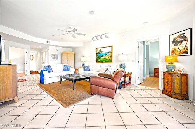 27071 Lake Harbor Ct Unit 103, Bonita Springs, FL 34134 - living room featuring ceiling fan, light tile patterned flooring, and rail lighting