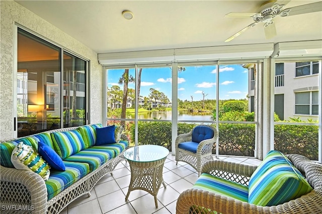 27071 Lake Harbor Ct Unit 103, Bonita Springs, FL 34134 - sunroom / solarium featuring a water view, tile patterned flooring, outdoor lounge area, and ceiling fan