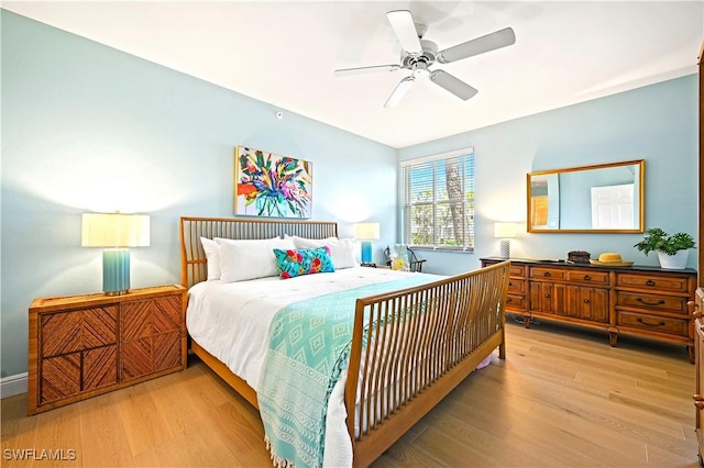 27071 Lake Harbor Ct Unit 103, Bonita Springs, FL 34134 - bedroom featuring light wood finished floors and ceiling fan