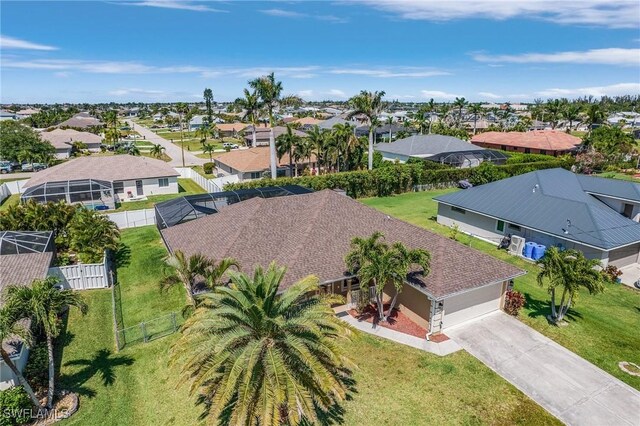 2626 SW 22nd Ave, Cape Coral, FL 33914 - drone / aerial view with a residential view