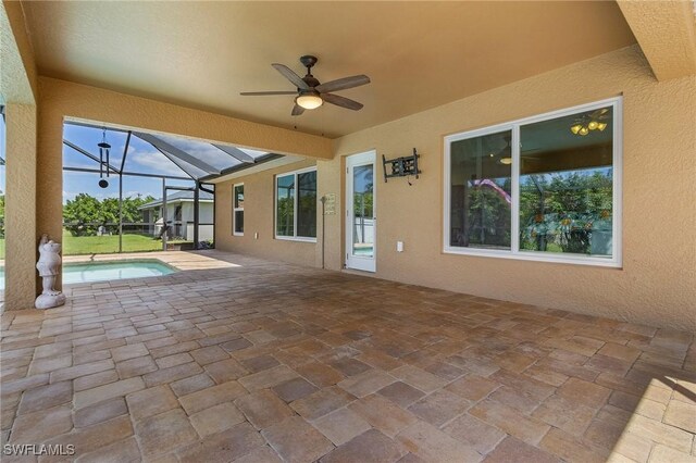 2626 SW 22nd Ave, Cape Coral, FL 33914 - view of patio / terrace featuring a ceiling fan, a lanai, and an outdoor pool