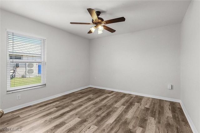 2626 SW 22nd Ave, Cape Coral, FL 33914 - unfurnished room featuring baseboards, wood finished floors, and ceiling fan