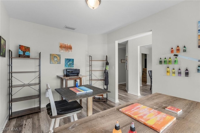 2626 SW 22nd Ave, Cape Coral, FL 33914 - interior space with baseboards, wood finished floors, and visible vents