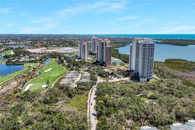 aerial view of a golf club and a nearby body of water