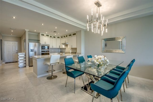 dining area with baseboards, recessed lighting, a notable chandelier, and crown molding
