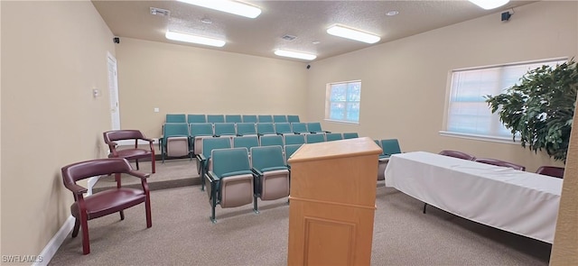 interior space with visible vents and a textured ceiling