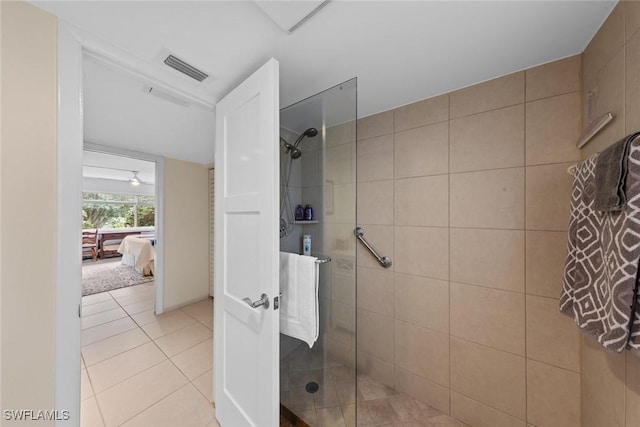 bathroom featuring visible vents, tile patterned flooring, connected bathroom, and tiled shower