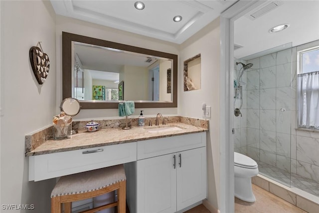 bathroom featuring a shower stall, visible vents, toilet, and vanity