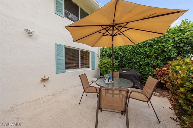 view of patio / terrace with outdoor dining space and area for grilling