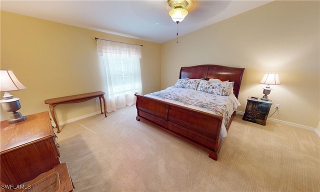 327 Monaco Dr Unit 12, Punta Gorda, FL 33950 - bedroom featuring ceiling fan, baseboards, and carpet flooring