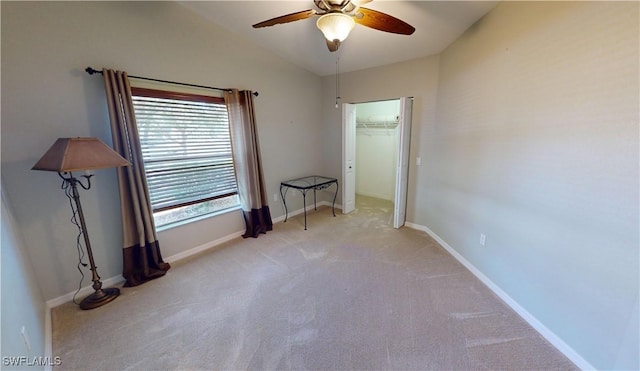 327 Monaco Dr Unit 12, Punta Gorda, FL 33950 - unfurnished bedroom with lofted ceiling, light carpet, baseboards, and ceiling fan