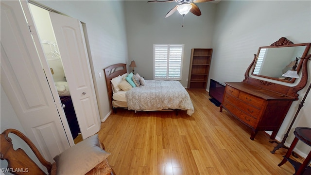 327 Monaco Dr Unit 12, Punta Gorda, FL 33950 - bedroom featuring ceiling fan, a towering ceiling, and light wood-style floors