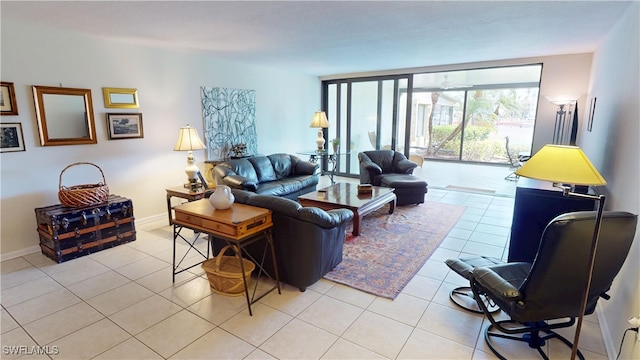3260 Southshore Dr Unit 65A, Punta Gorda, FL 33955 - living area featuring baseboards and light tile patterned floors