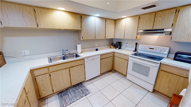3260 Southshore Dr Unit 65A, Punta Gorda, FL 33955 - kitchen with a sink, visible vents, white appliances, light brown cabinets, and under cabinet range hood