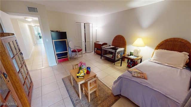 3260 Southshore Dr Unit 65A, Punta Gorda, FL 33955 - bedroom featuring light tile patterned flooring, a closet, and visible vents