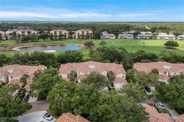 93 Silver Oaks Cir Unit 3-101, Naples, FL 34119 - bird's eye view with a residential view, a water view, and view of golf course