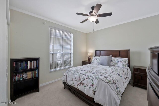 93 Silver Oaks Cir Unit 3-101, Naples, FL 34119 - bedroom with baseboards, ornamental molding, ceiling fan, and light colored carpet
