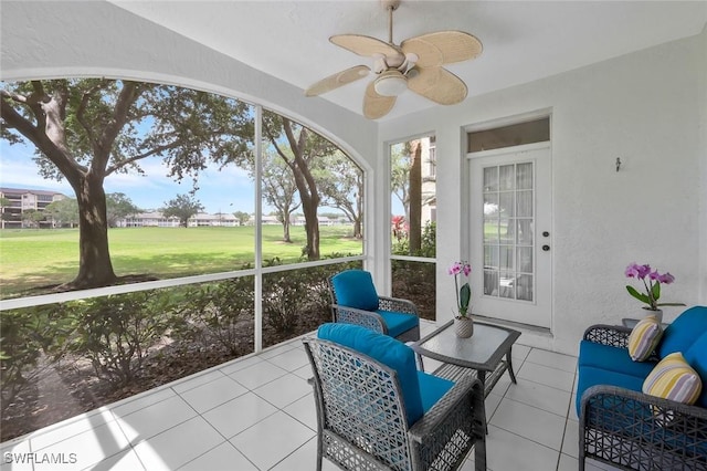 93 Silver Oaks Cir Unit 3-101, Naples, FL 34119 - sunroom featuring a ceiling fan