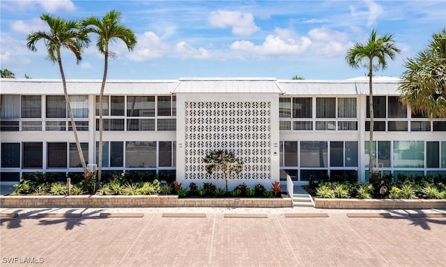 2100 Gulf Shore Blvd N Unit 108, Naples, FL 34102 - view of property featuring uncovered parking