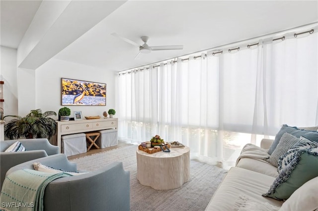 2100 Gulf Shore Blvd N Unit 108, Naples, FL 34102 - living room with ceiling fan and healthy amount of natural light