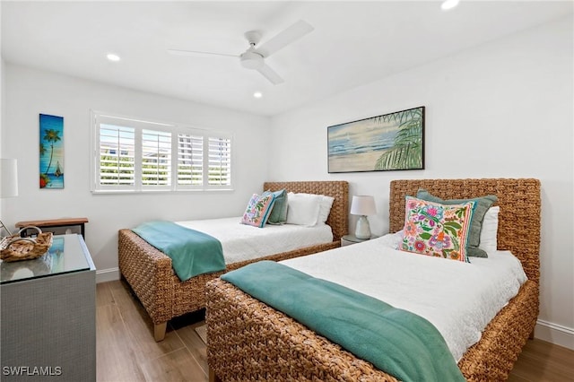 2100 Gulf Shore Blvd N Unit 108, Naples, FL 34102 - bedroom featuring wood finished floors, recessed lighting, ceiling fan, and baseboards