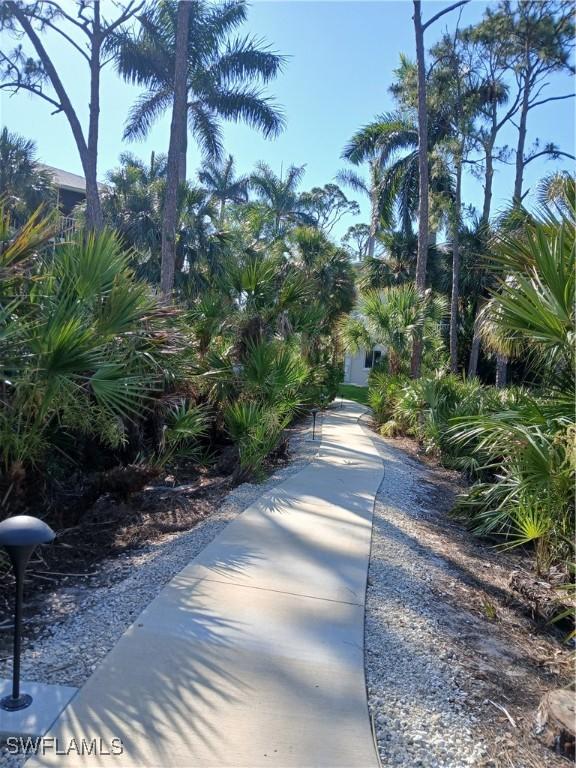 3051 Sandpiper Bay Cir Unit I102, Naples, FL 34112 - view of road with street lights