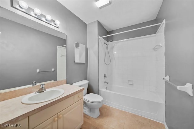 2061 Willow Hammock Cir Unit 303, Punta Gorda, FL 33983 - bathroom featuring  shower combination, tile patterned floors, vanity, and toilet