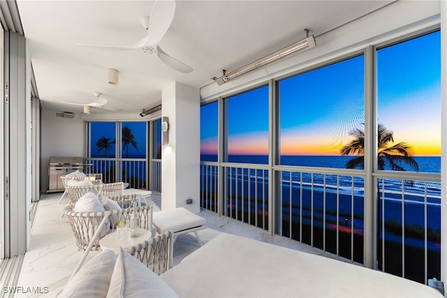 exterior space featuring a water view and visible vents