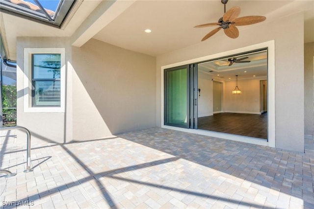 view of patio featuring a ceiling fan