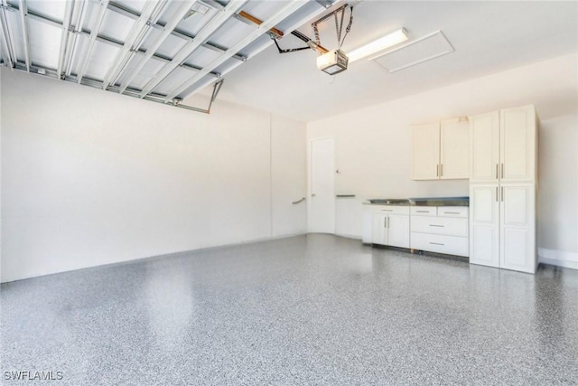 garage featuring a garage door opener