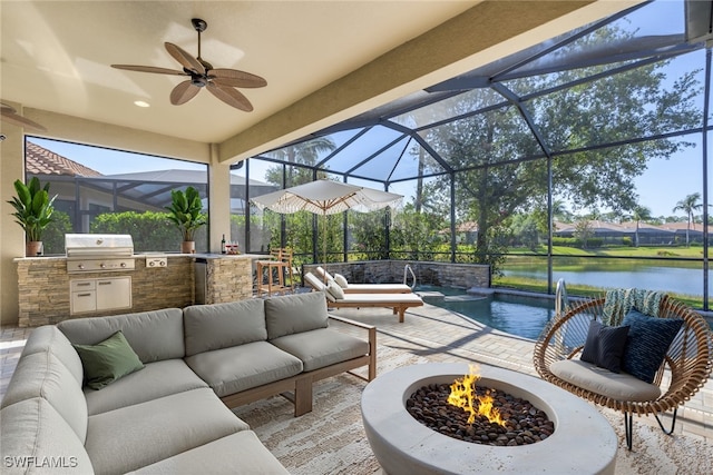 view of patio / terrace featuring glass enclosure, an outdoor living space with a fire pit, a water view, a grill, and area for grilling