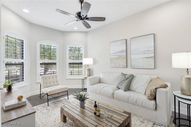 living room with wood finished floors, recessed lighting, ceiling fan, and a healthy amount of sunlight