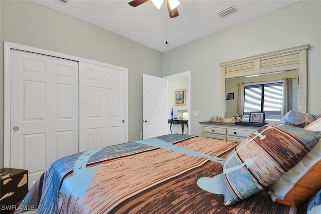 2728 Beach Pkwy W, Cape Coral, FL 33914 - bedroom featuring a closet and a ceiling fan