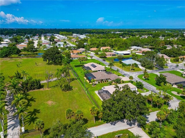 225 Brighton Ct, Englewood, FL 34223 - drone / aerial view featuring a residential view