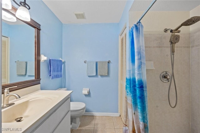 full bath featuring tiled shower, tile patterned floors, toilet, vanity, and visible vents